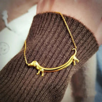Weaver | Sausage Dog Paw Pendant