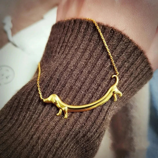 Weaver | Sausage Dog Paw Pendant