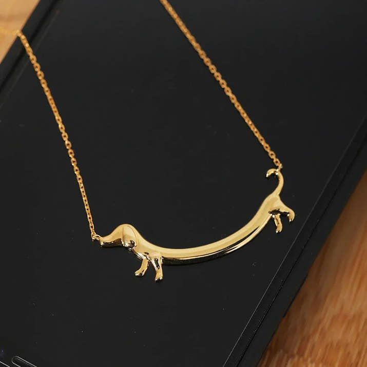 Weaver | Sausage Dog Paw Pendant